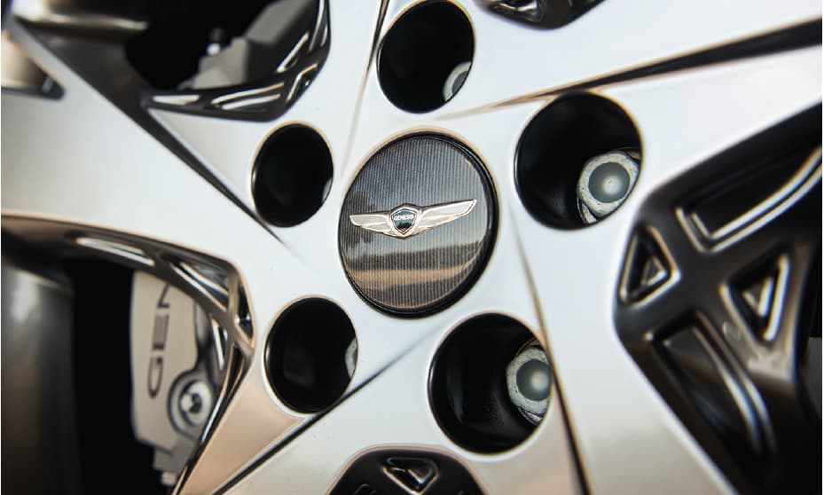 Genesis GV80 emblem on tire rim